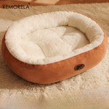 cozy oval snuggle pet bed plush thick cushion | warm cat bed for indoor cats soft sleeping bed | oval pet bed for small medium dogs cozy comfort | soft plush pet bed for cats and dogs all seasons | thick warm pet cushion bed for deep sleep and relaxation | comfortable oval pet bed for indoor use | cozy pet sleeping bed for cats and small dogs